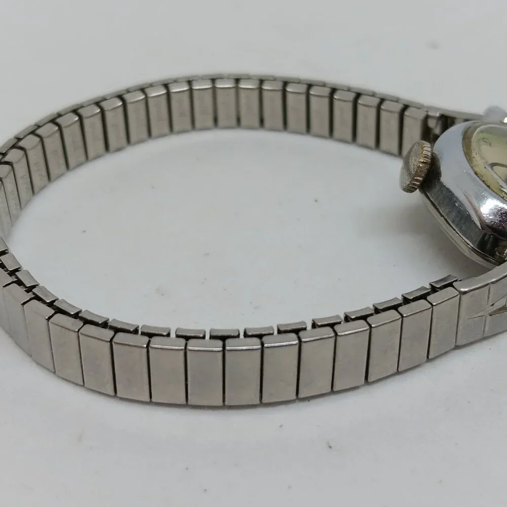 VINTAGE Timex Manual Wind Women's 17 mm Silver Tone Cocktail Flex Band Watch